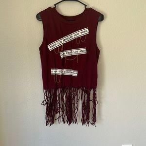 Ladies sleeveless shirt maroon worn a few times fringe at the bottom